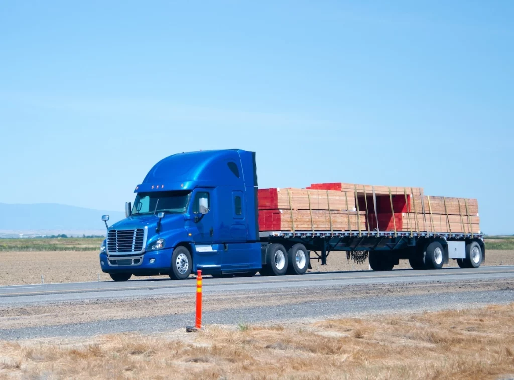 Dry Van & Conestoga Flatbed Trucking to New Brunswick