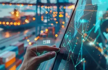Digital screen with data visualization overlaying a container port and cargo ship